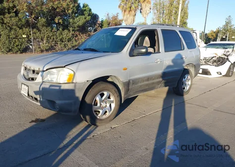 2002 Mazda Tribute Dx z USA, uszkodzony, nr VIN 4F2YU06B42KM34378